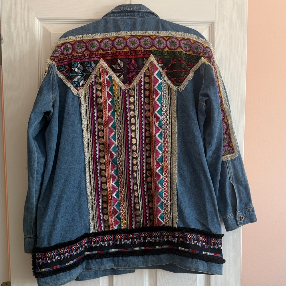 Velzera Blue Denim Jacket with Embroidery sleeves and back.